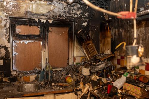 This shows a kitchen destroyed by fire 