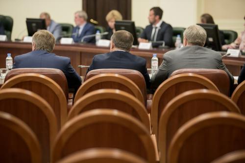 People in business formalwear having a meeting