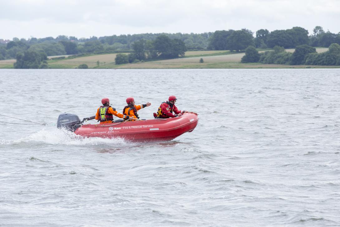 KFRS water rescue boat travelling across a lake
