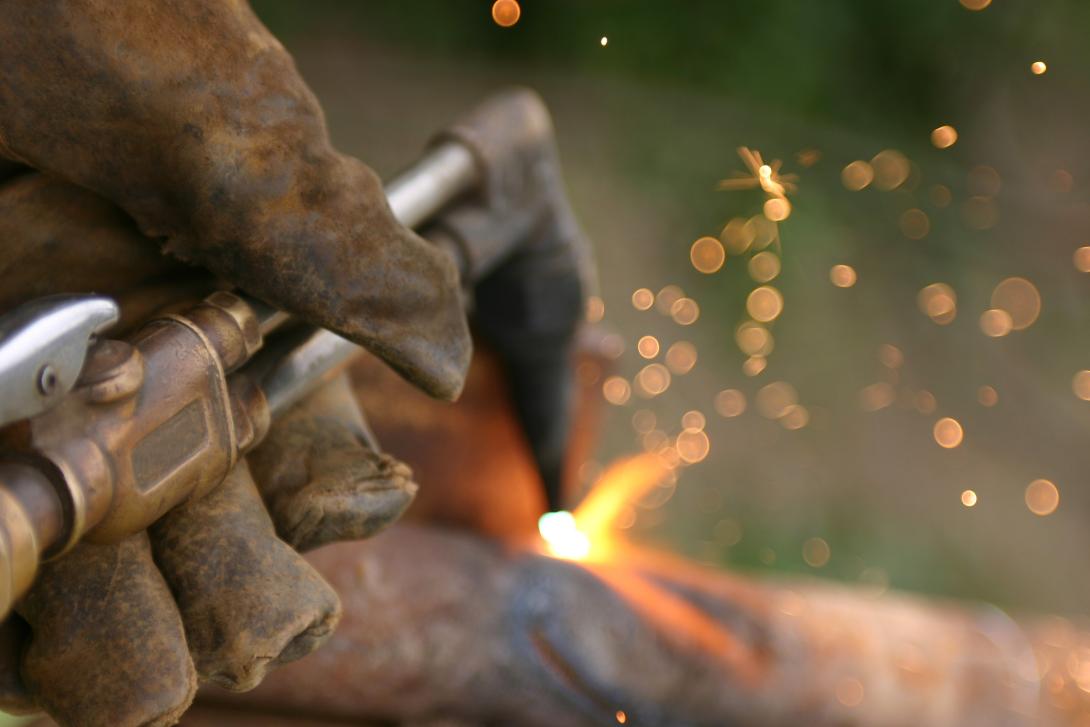 Cutting with white hot flame and sparks