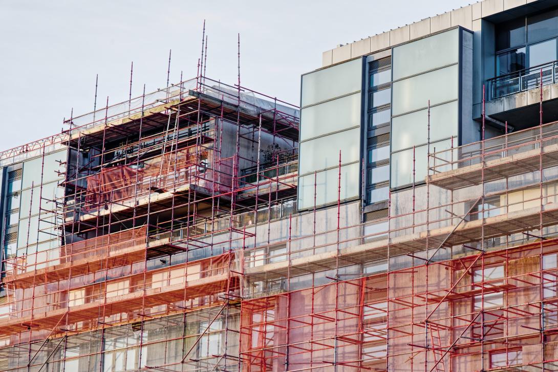 high rise building with scaffolding