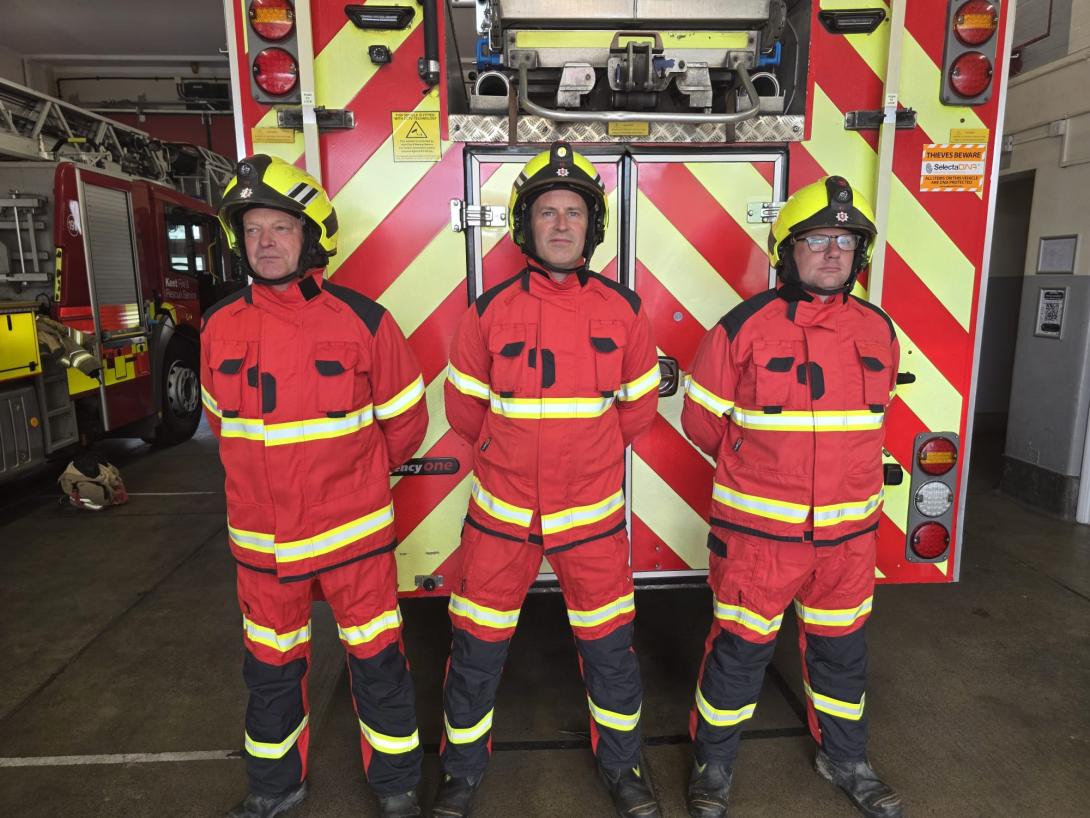 Three firefighters wearing the new lightweight PPE.