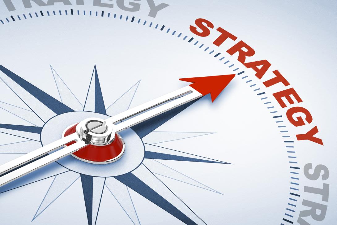 Compass pointed to the word Strategy